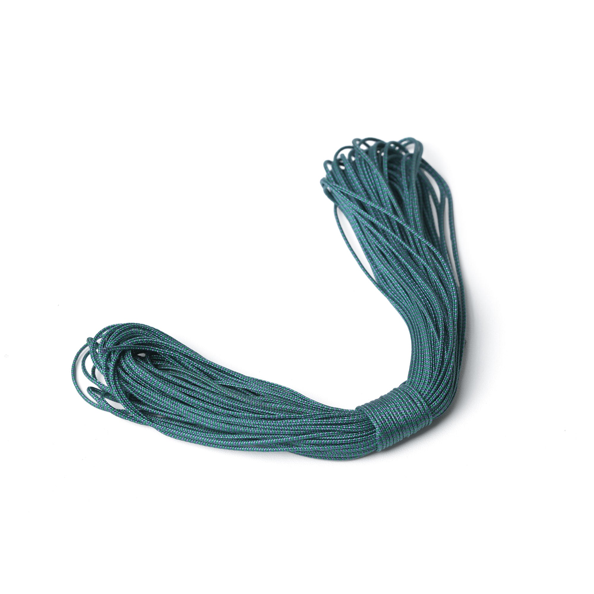 Coiled 50 ft length of green and purple ThruLine 1 mm guyline on a white background.